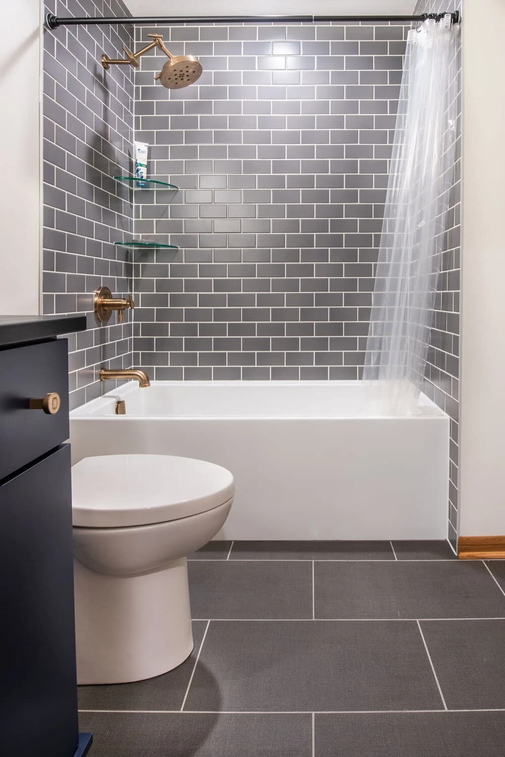 Refinished bathtub with new tile surround