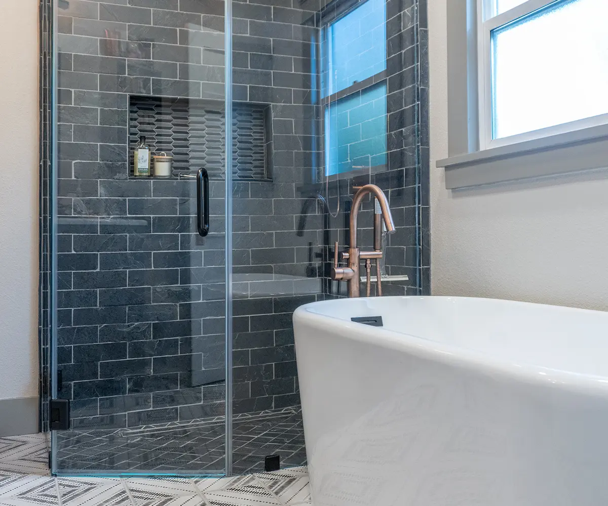 Freestanding tub installation with floor tile