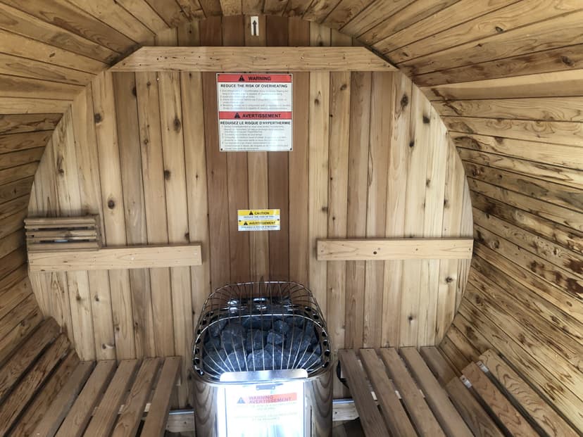 Modern home sauna with wooden interior and relaxation seating